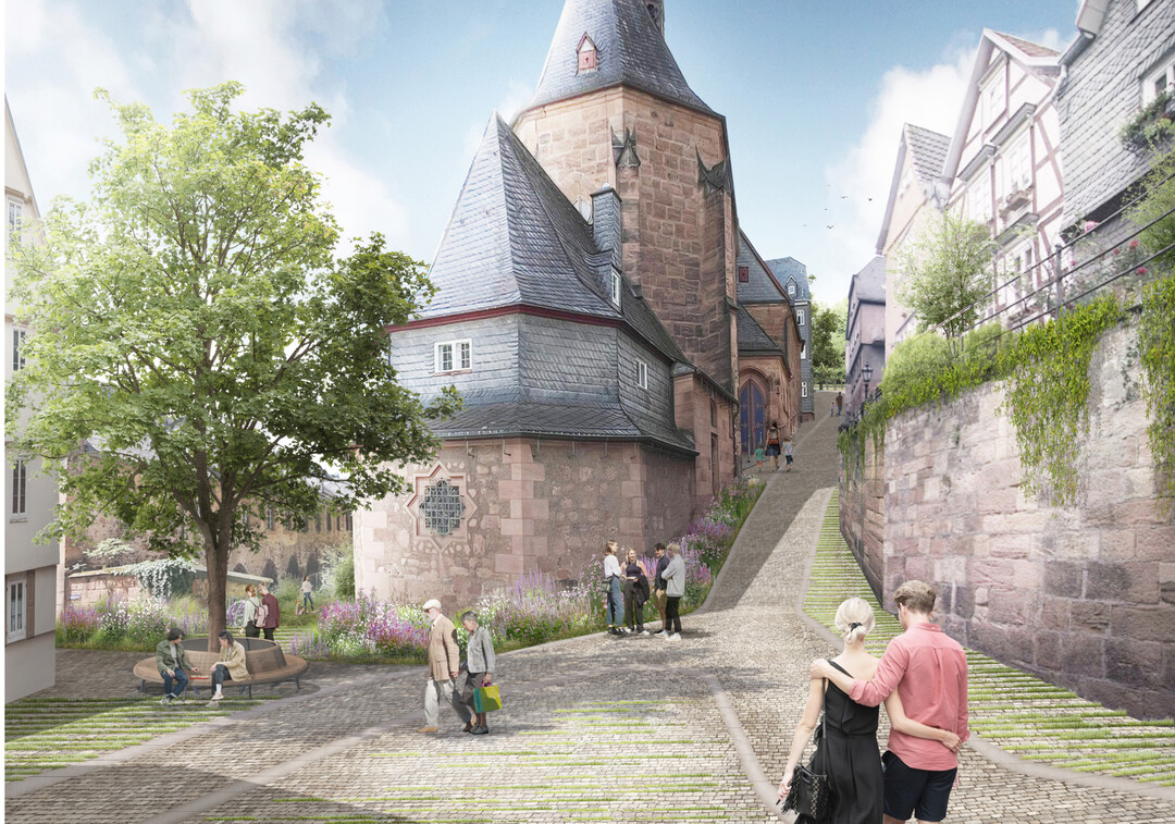 Die Universittsstadt Marburg ist geprgt durch ihre besondere topographische Lage am Hang des Schlossbergs mit dem besonderen Ausblick der Oberstadt auf das Lahntal. Die zentrale Lage des Lutherischen Kirchhofs an der St. Marienkirche innerhalb der historischen Altstadt ist der wichtigste Verbindungspunkt zwischen Marktplatz und Schlossberg. So wird der Kirchhof zu einem der bedeutsamsten Freirume in der Marburger Oberstadt. Um seiner besonderen, wortwrtlich herausgehobenen, Bedeutung im Stadtbild auch zuknftig gerecht werden zu knnen, sieht der Entwurf vor, die Lutherische St. Marienkirche auf ein grnes Podest zu stellen.
Der Stadtbalkon, auf dem die Kirche thront, wird somit zum zentralen, grnen Erholungsort der Oberstadt. AUSZUG ERLUTERUNGSTEXT